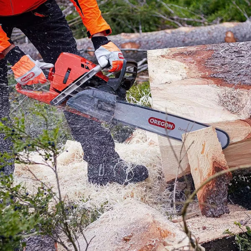 Man cutting a log using a chainsaw with Oregon branding.