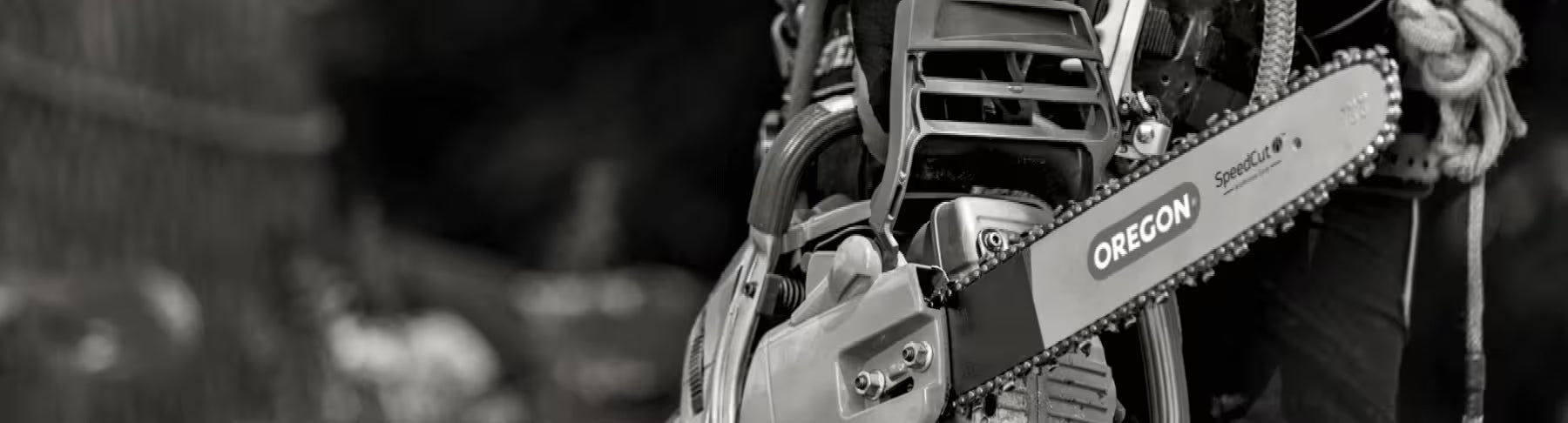 Black & White Image of Chainsaw with Oregon branding