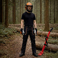 Man with felling lever wearing Oregon safety gear including chainsaw trousers, boots, helmet & gloves.
