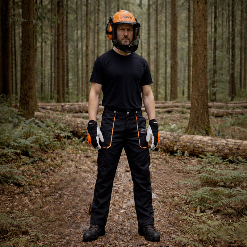 Man wearing Oregon safety gear including chainsaw trousers, boots, helmet & gloves.